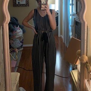 Black and white jumpsuit with tie size s/m